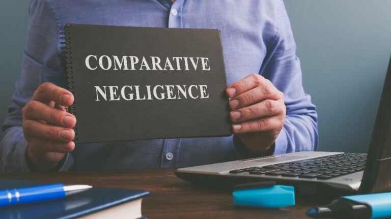 Man shows Comparative negligence text